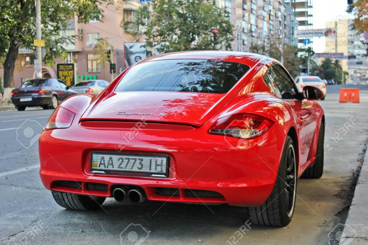 88517995-july-3-2013-kiev-ukraine-porsche-cayman-s-red-editorial-photo-